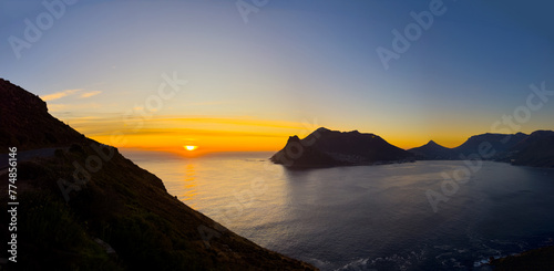 Hout Bay coastal mountain landscape at sunset in Cape Town.