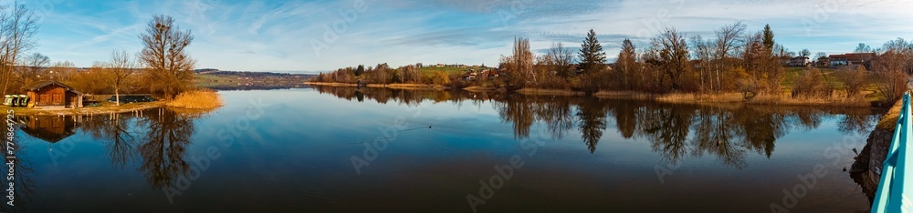High resolution stitched alpine winter panorama with reflections at Lake Waginger See, Traunstein, Bavaria, Germany High resolution stitched alpine winter panorama with reflections at Lake Waginger See, Traunstein, Bavaria, Germany