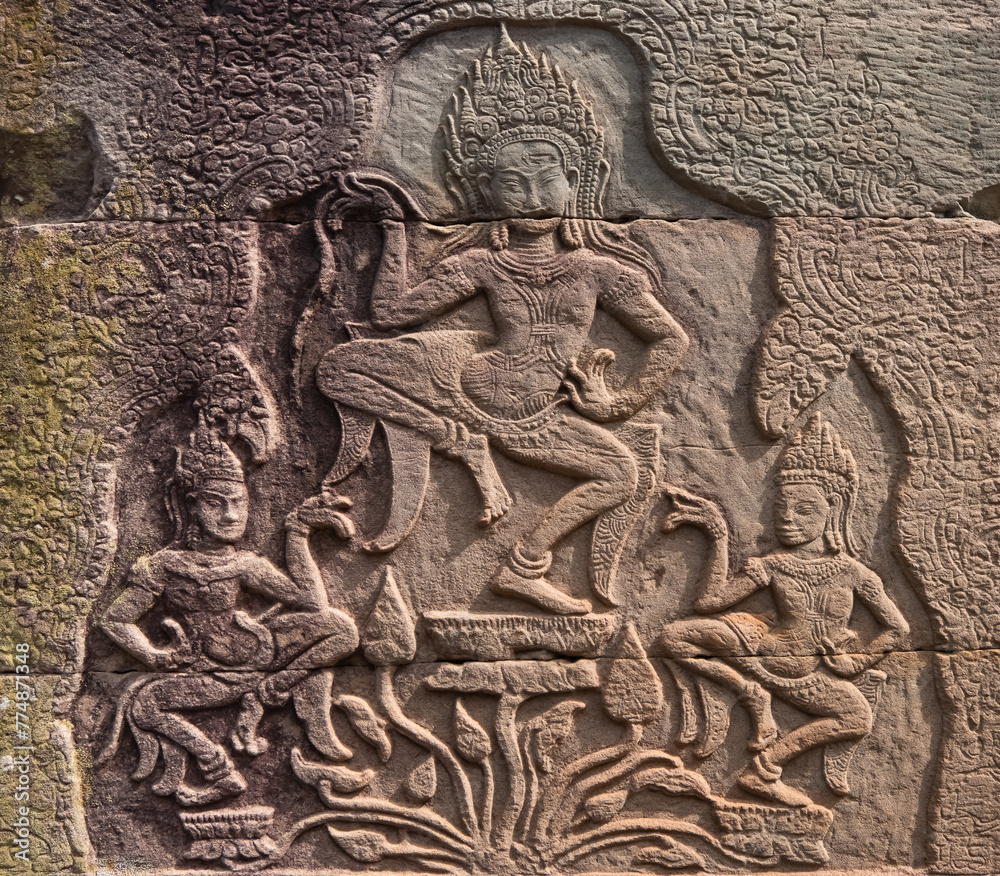 Bas-relief - Bas-relief at Bayon temple in Angkor Thom. Siem Reap. Cambodia. Panorama