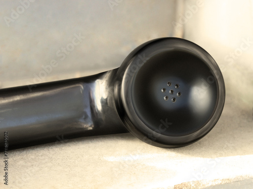 Close-up of a black telephone receiver