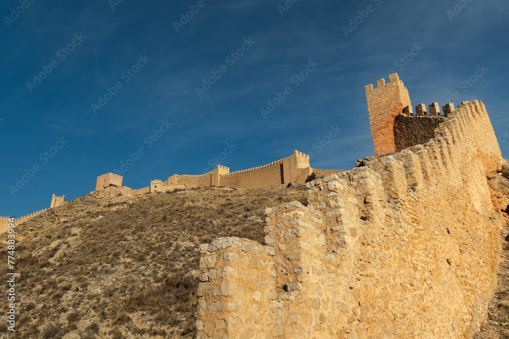 The medieval wall of Albarracín, with its watchtowers and battlements.
