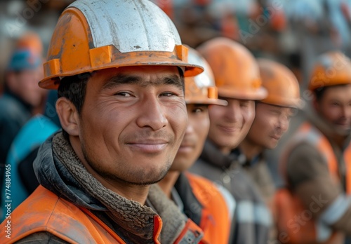 Smiling Kazakh Construction Workers: Portrait of Immigrant Labor © Mike