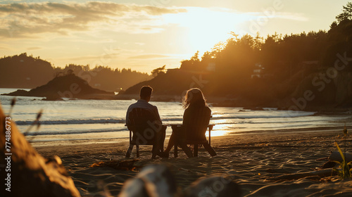 Couple Enjoying Sunset on a Secluded Beach © PixelGuru