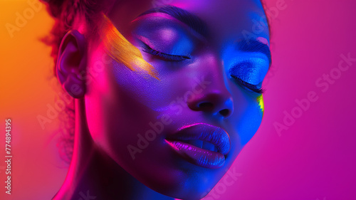 Professional beauty portrait of a beautiful girl posing under vibrant neon lighting. Colorful makeup, female high fashion model on a colorful bright background, artistic design, UV design.