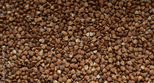 Texture of loose buckwheat on the table