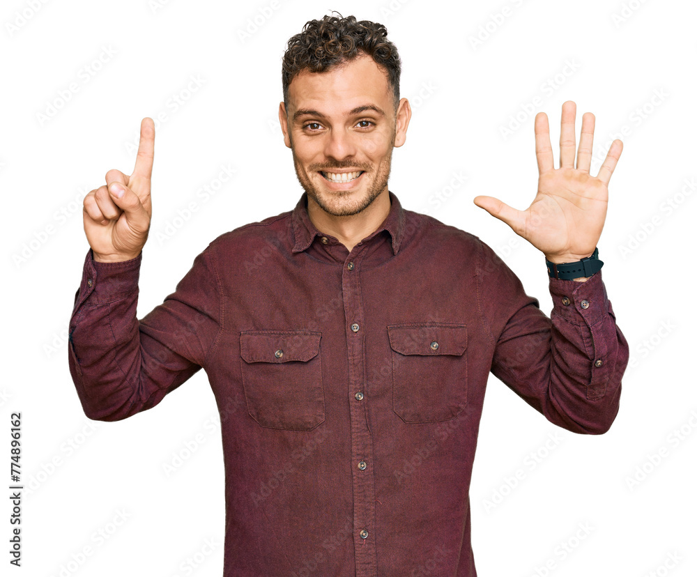 Young hispanic man wearing casual clothes showing and pointing up with fingers number six while smiling confident and happy.