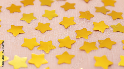 Golden star confetti close up view