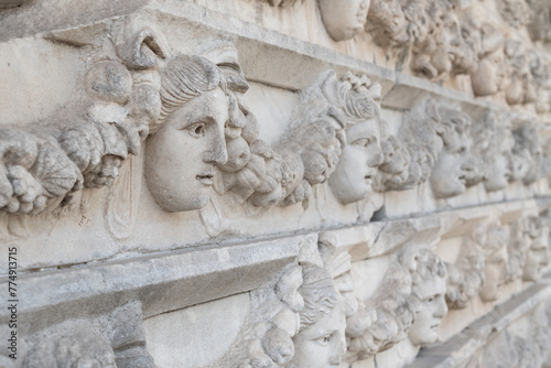 Ancient Mask Relief in Aphrodisias Ancient City in Geyre, Aydin, Turkey.