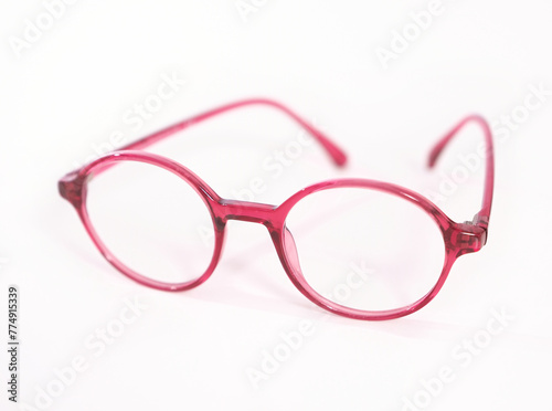 Children's glasses with a red frame photo