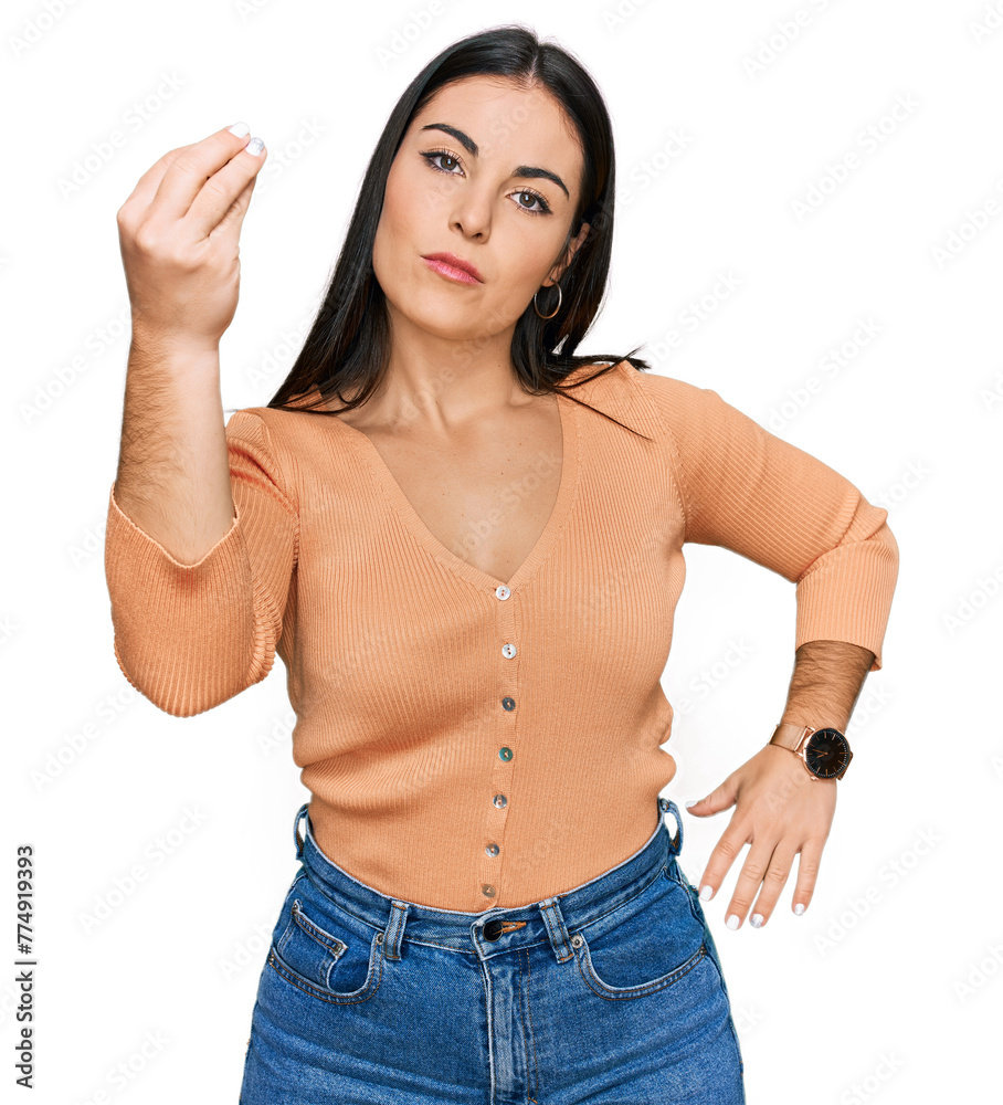 Young hispanic woman wearing casual clothes doing italian gesture with hand and fingers confident expression Young hispanic woman wearing casual clothes doing italian gesture with hand and fingers confident expression