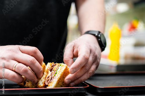Freshly made sandwich with visible layers, showcasing quick and delicious food preparation