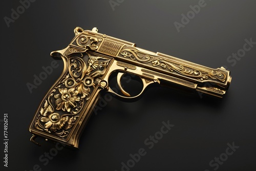 a gold gun on a black surface