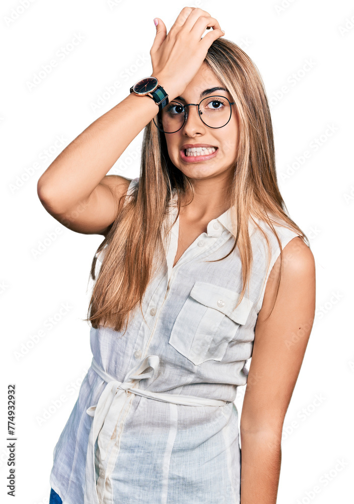 Hispanic young woman wearing casual white shirt surprised with hand on head for mistake, remember error. forgot, bad memory concept. Hispanic young woman wearing casual white shirt surprised with hand on head for mistake, remember error. forgot, bad memory concept.