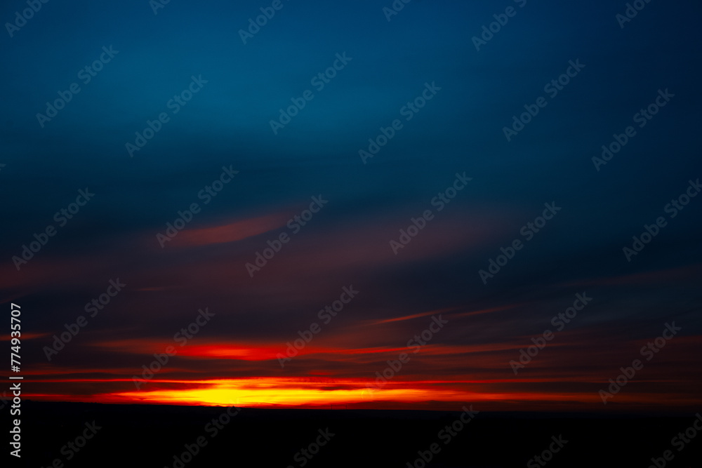 Colourful landscape of beautiful dark sunset or sunrise close to evening.