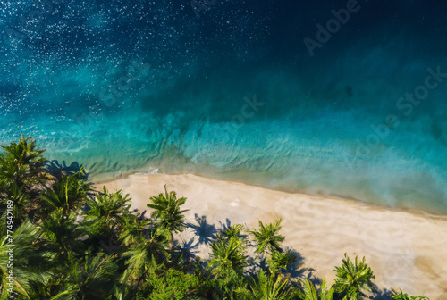 Scenic summer coastline view with mountains, beach, and blue ocean water © Robert Kiyosaki