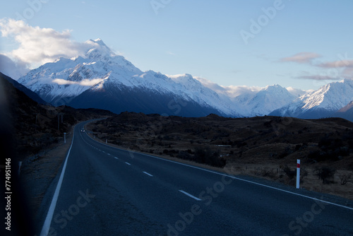 Road winding into the snowy mountains
