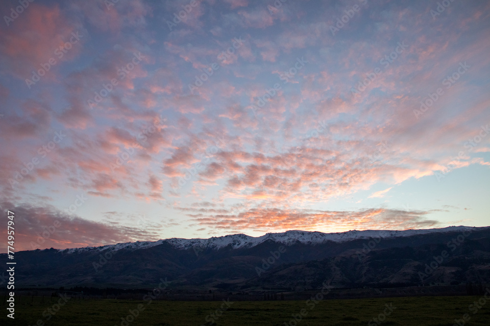 Sunset sprinkling red over the cirrus clouds