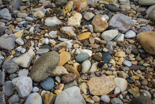 Coastal pebbles on the beach, closeup of photo with lovely details