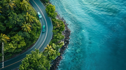 Aerial view of curved asphalt road near the ocean or sea, coastline