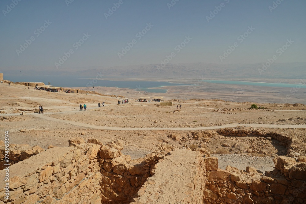Obraz premium Aerial view of Masada with ancient fortress and rocky mountains in Israel