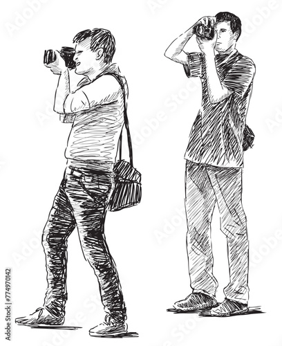 Photographers, two young men taking pictures on camera, profile, sketch, vector hand drawing black and white isolated on white