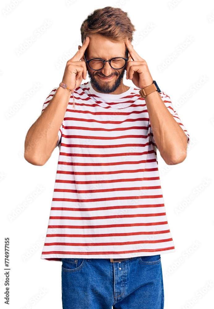 Handsome blond man with beard wearing casual clothes and glasses with hand on head, headache because stress. suffering migraine. Handsome blond man with beard wearing casual clothes and glasses with hand on head, headache because stress. suffering migraine.