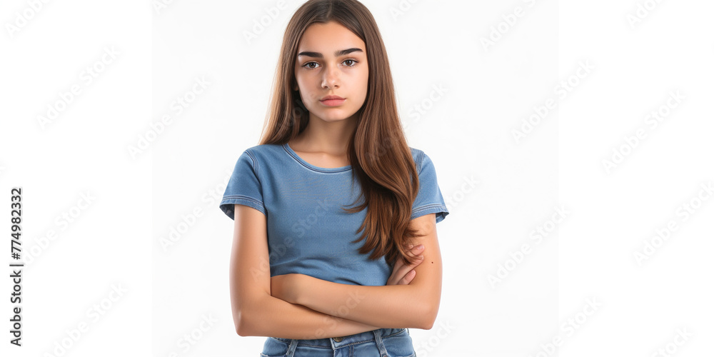 Portrait of an upset young casual girl standing with arms folded isolated over white background High resolution professional photography Portrait of an upset young casual girl standing with arms folded isolated over white background High resolution professional photography