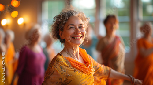 Older woman with a group of seniors and retirees practicing yoga or dance classes. Activity and leisure in mature people photo