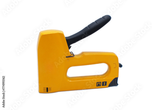 Staple gun isolated on white background orange yellow color with black rubber grip handle