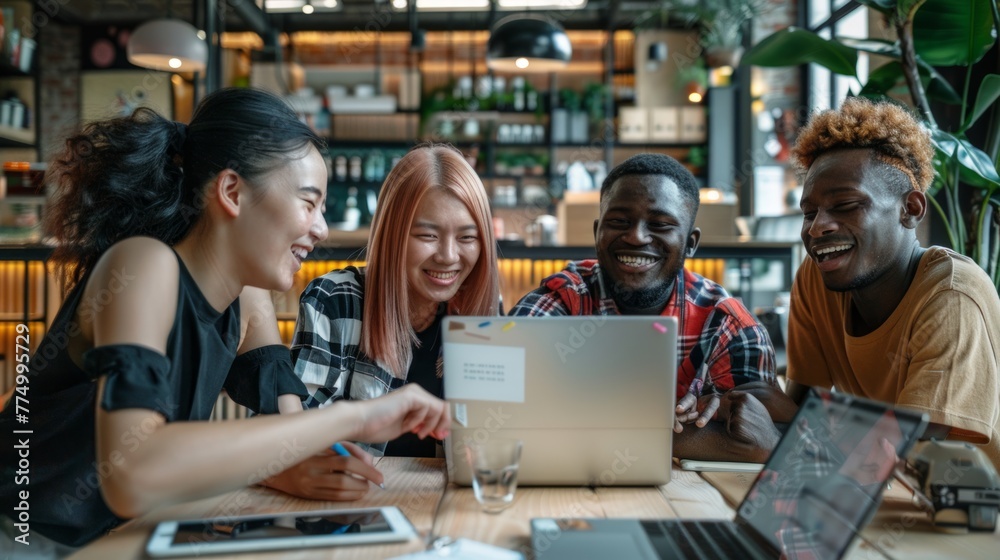 custom made wallpaper toronto digitalA group of people are sitting around a table with a laptop open