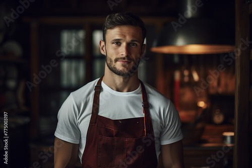 AI generated image of smiling male chef standing in a restaurant kitchen © Tetiana