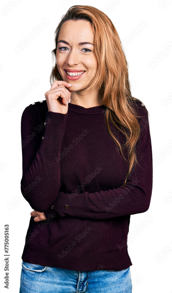 Young caucasian woman wearing casual clothes looking confident at the camera with smile with crossed arms and hand raised on chin. thinking positive. Young caucasian woman wearing casual clothes looking confident at the camera with smile with crossed arms and hand raised on chin. thinking positive.