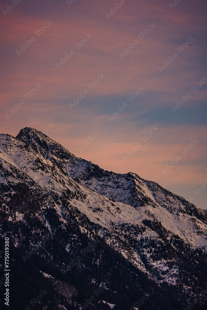 Snowy mountain during sunset