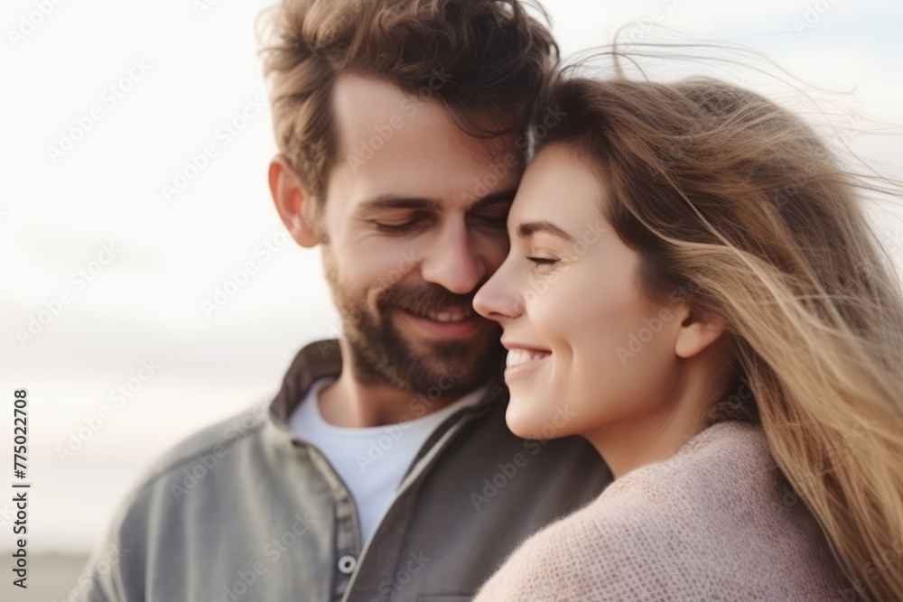 A joyful couple embracing in a warm sunset light, sharing a moment of love and happiness outdoors. Happy Couple Embracing Outdoors in Sunset Light A joyful couple embracing in a warm sunset light, sharing a moment of love and happiness outdoors. Happy Couple Embracing Outdoors in Sunset Light