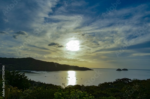 Beautiful view of a sea with boats from an island during sunrise