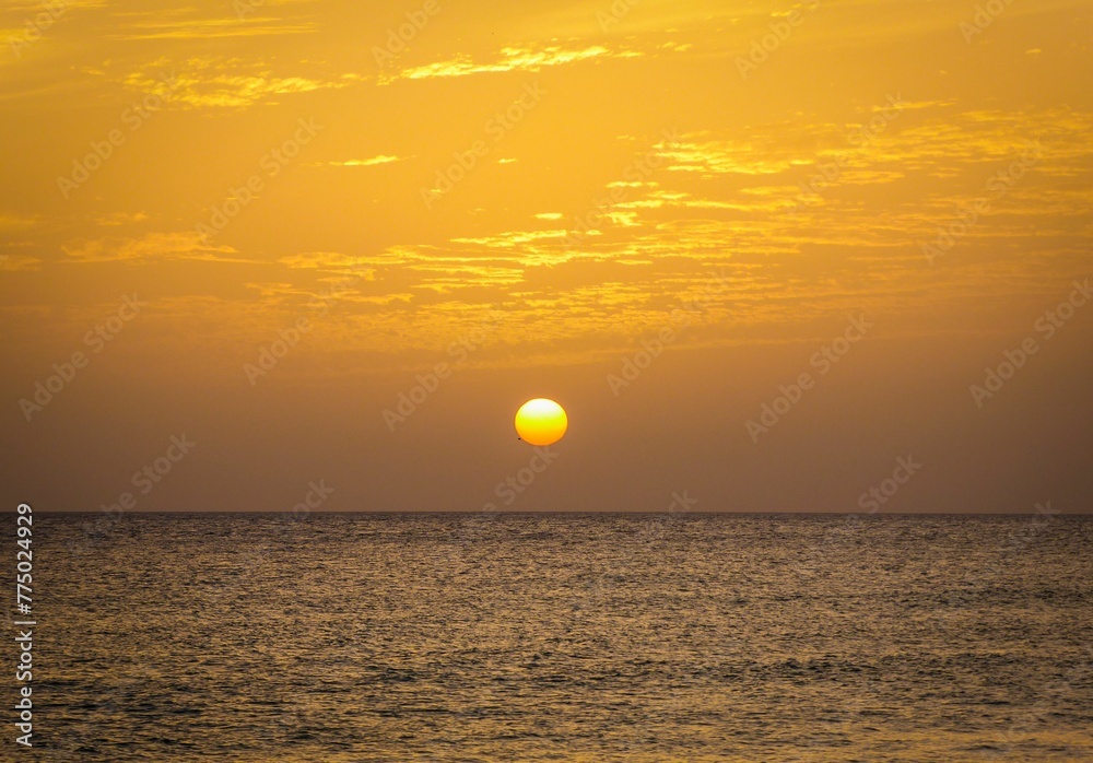 Golden sunset in a summer beach Golden sunset in a summer beach