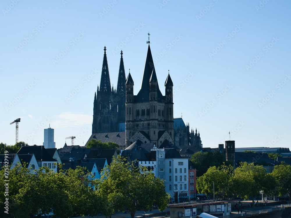 Skyline of Catholic Cathedral of Cologne in North Rhine-Westphalia, Germany against the blue sky