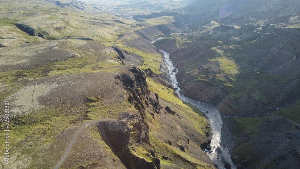 Drone shot over Haifoss Waterfall in Iceland  river Fossa on a sunny day