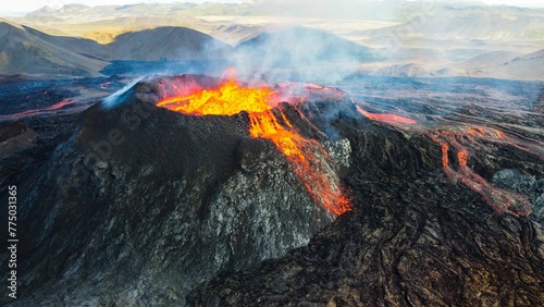 Lava erupting from a volcano © Wirestock