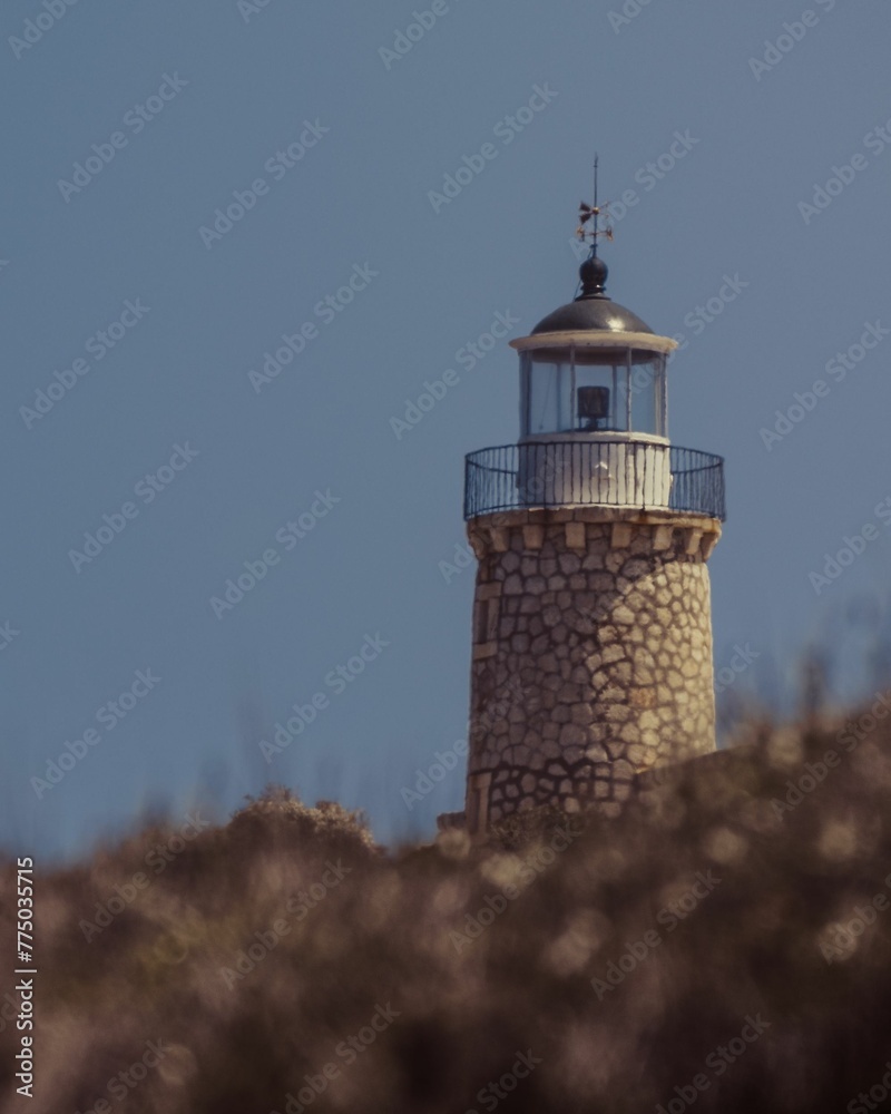 Vertical shot of the Skinari Lighthouse in Greece.