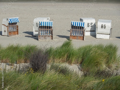 Strandkorbs, special hooded windbreak seating furniture captured at a beach