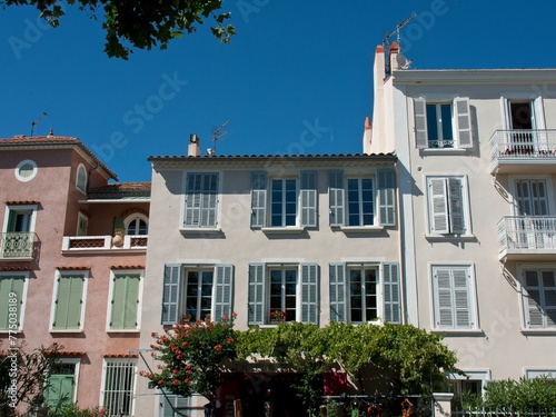 Exterior of a medieval stone traditional house building with blue sky in Sanary-sur-Mer, France