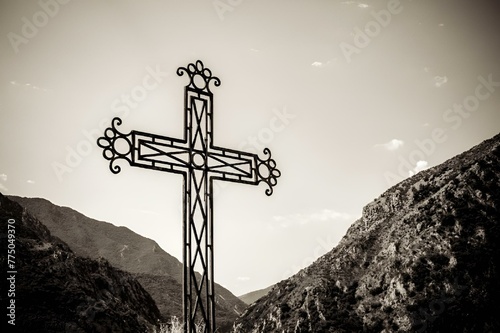 Cross in Saorge, France against a clear sky photo