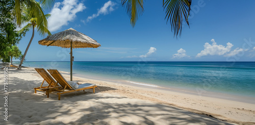Tropical beach on a dream vacation in the Caribbean with blue skies, sun loungers and palm trees - Topic Travel, vacation and travel agency © Steffen Kögler