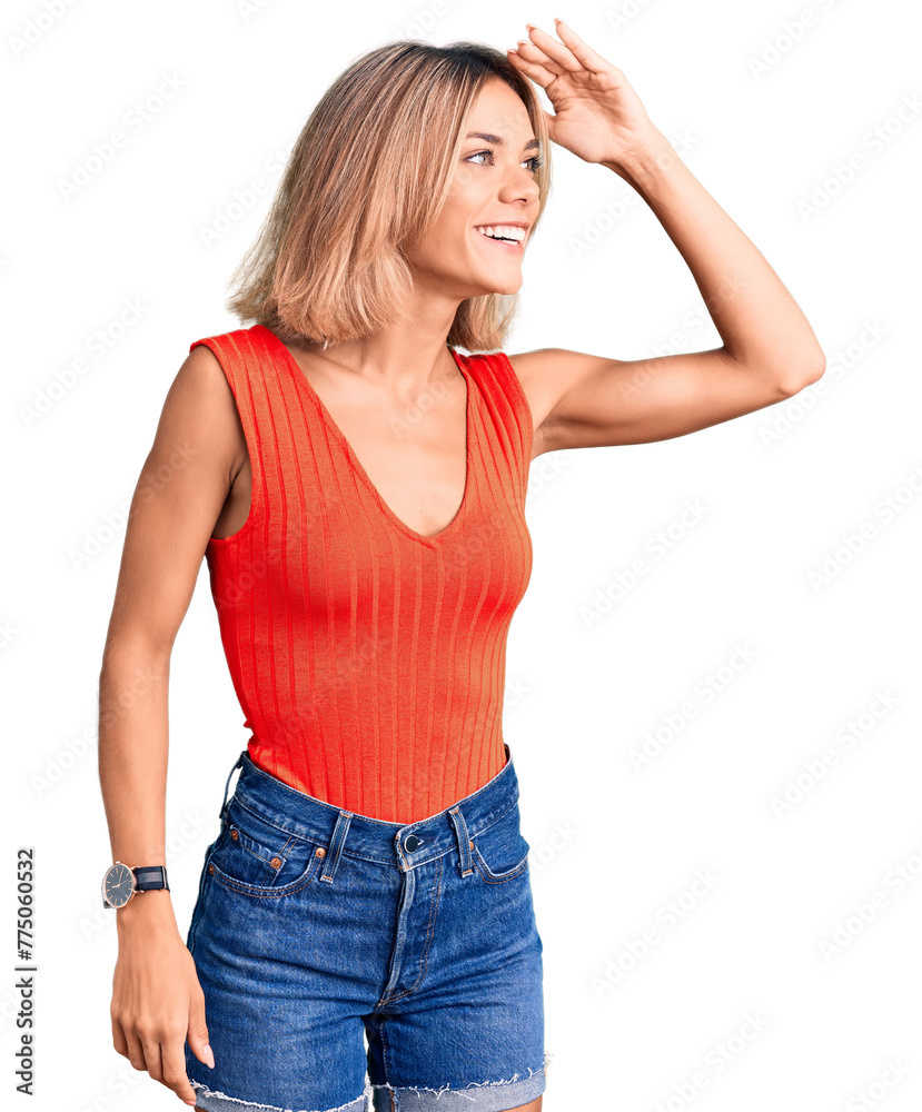 Beautiful caucasian woman wearing casual clothes very happy and smiling looking far away with hand over head. searching concept. Beautiful caucasian woman wearing casual clothes very happy and smiling looking far away with hand over head. searching concept.