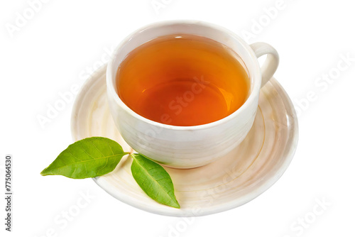 Fresh brewed black or red tea in a cup with a leaf, isolated