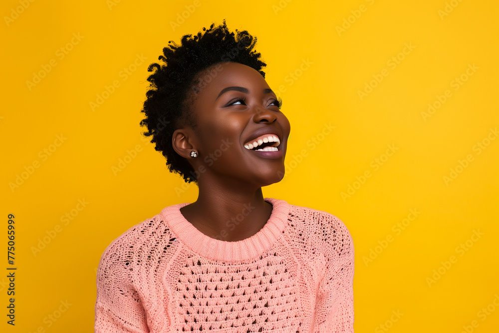 Photo of black woman with short hair laughing, wearing pink sweater isolated on yellow background with copy space , studio shot, Photo of black woman with short hair laughing, wearing pink sweater isolated on yellow background with copy space , studio shot,