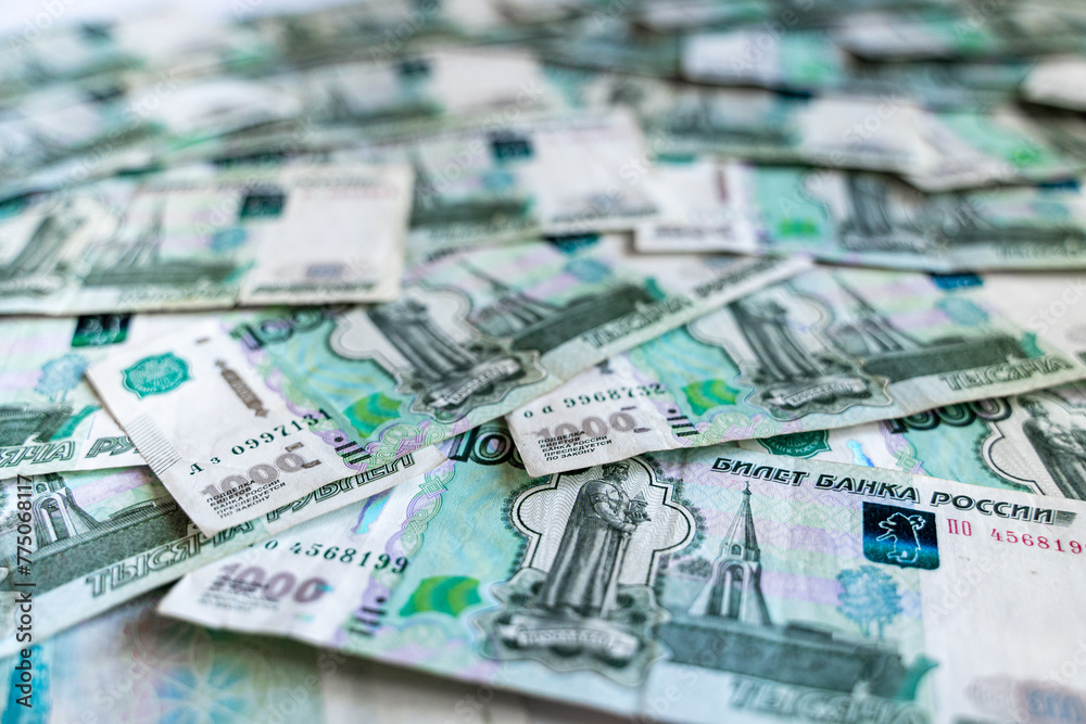 Russian banknotes of one thousand rubles, background from Russian banknotes Russian banknotes of one thousand rubles, background from Russian banknotes