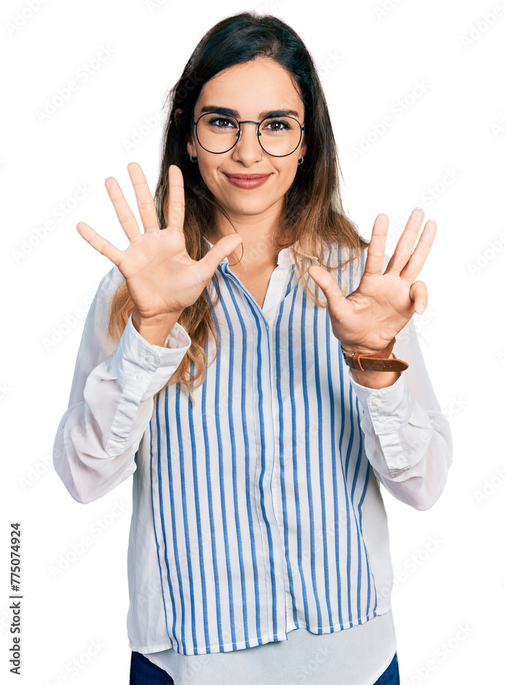 Beautiful hispanic woman wearing casual striped shirt showing and pointing up with fingers number nine while smiling confident and happy. Beautiful hispanic woman wearing casual striped shirt showing and pointing up with fingers number nine while smiling confident and happy.