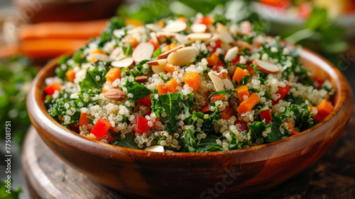 A bowl of quinoa salad with kale and almonds